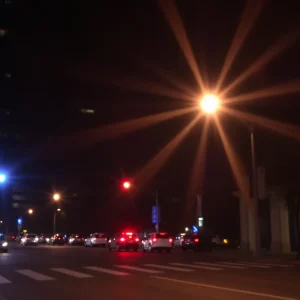 Night view of downtown Indianapolis with police emergency lights flashing
