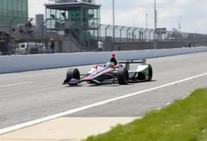Mick Schumacher driving an IndyCar at the Indianapolis Motor Speedway during a test session.