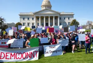 Diverse crowd of protesters at the Indiana Statehouse during the No Kings protests.