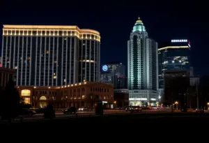 A serene view of downtown Indianapolis at night with glowing hotel lights.