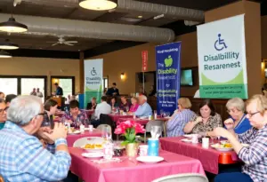Community members dining at Murphy's Steakhouse for a disability support fundraiser.