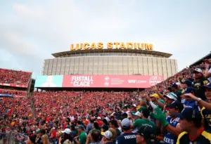 Exterior view of Lucas Oil Stadium with fans during an event.