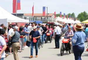 Community members celebrating the 500 Festival under the theme Racing Through History.